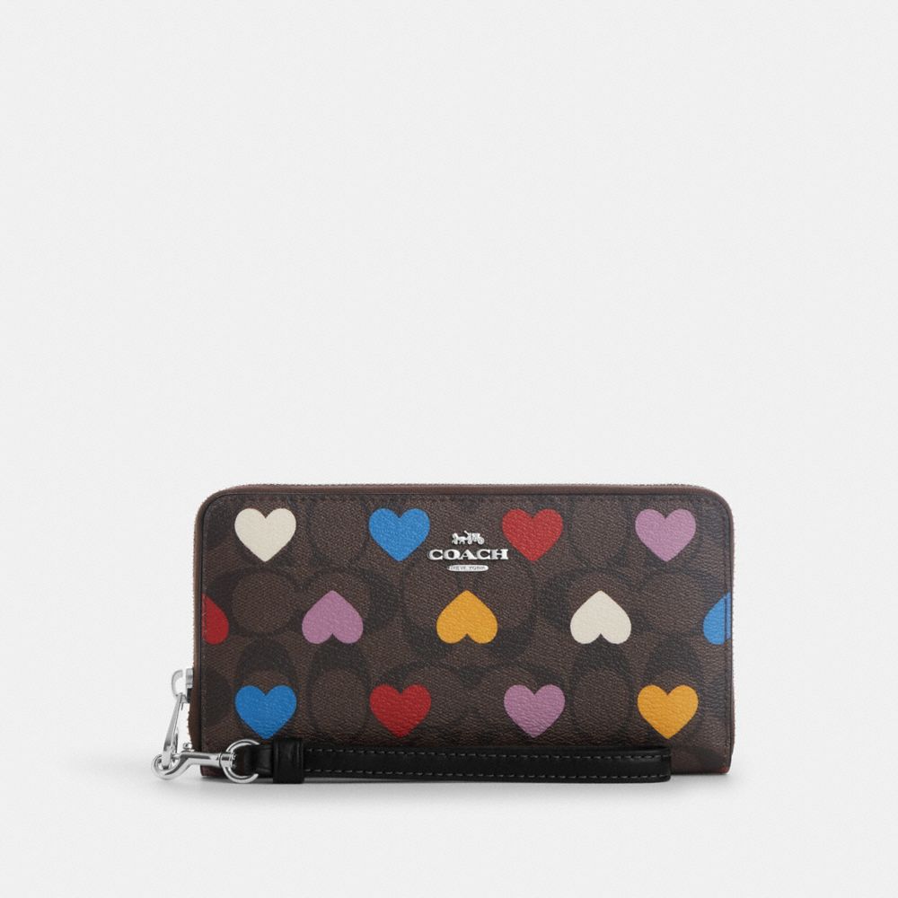 COACH® | Long Zip Around Wallet In Signature Canvas With Heart Print