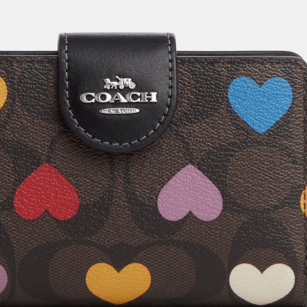 COACH®,MEDIUM CORNER ZIP WALLET IN SIGNATURE CANVAS WITH HEART PRINT,Signature Canvas,Mini,Silver/Brown Black Multi