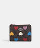 COACH®,BIFOLD WALLET IN SIGNATURE CANVAS WITH HEART PRINT,Leather,Silver/Brown Black Multi,Front View