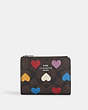 COACH®,BIFOLD WALLET IN SIGNATURE CANVAS WITH HEART PRINT,Leather,Silver/Brown Black Multi,Front View