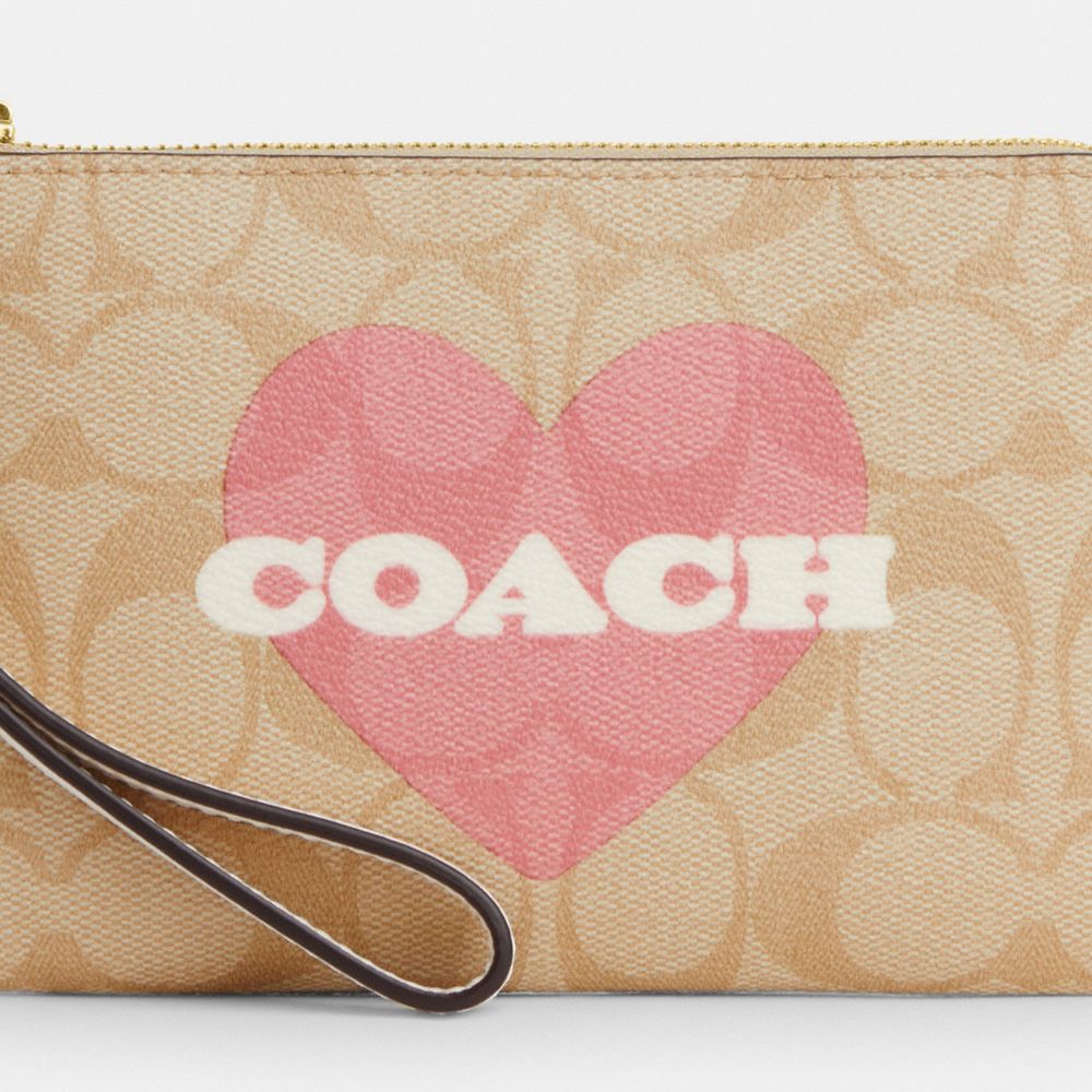 COACH®,WRISTLET À ZIP EN COIN EN TOILE SIGNATURE AVEC IMPRIMÉ COEUR,pvc,Or/Kaki pâle Craie Multi