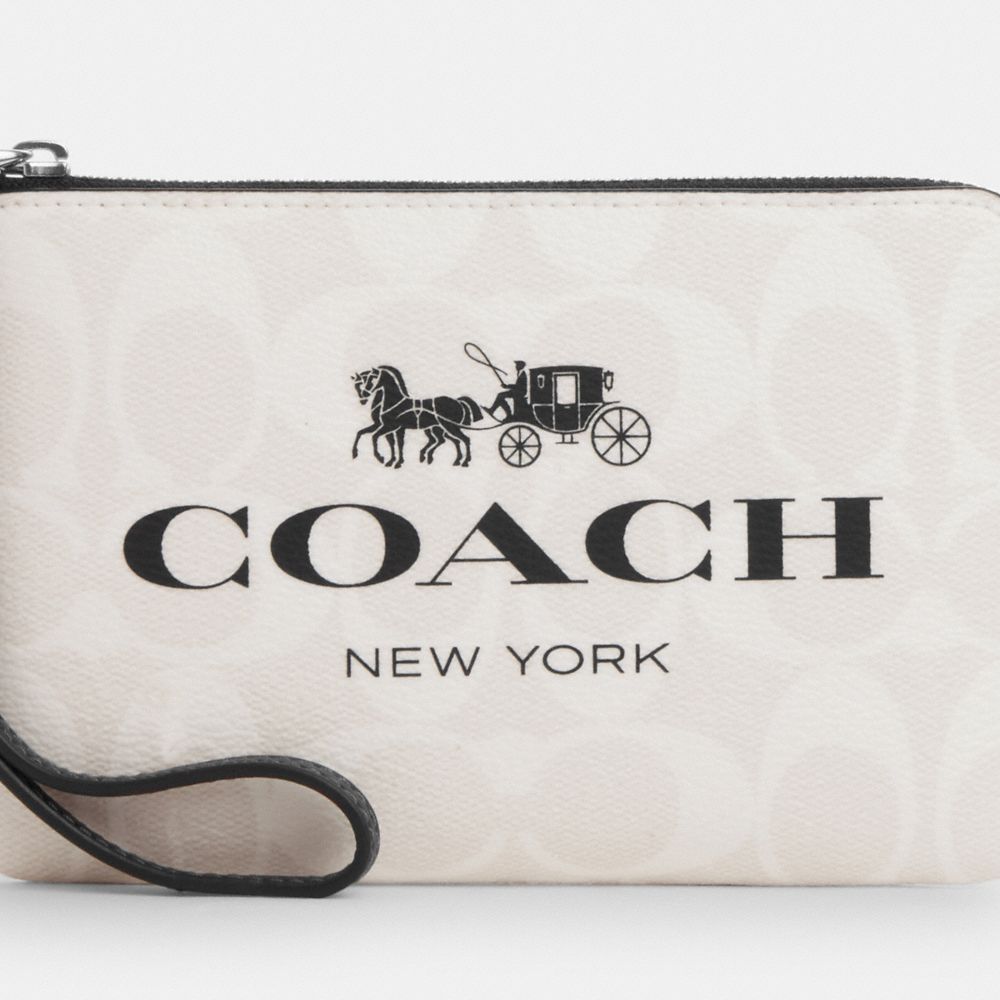 COACH®,Corner Zip Wristlet In Signature Canvas,