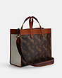COACH®,FIELD TOTE 40 WITH LARGE HORSE AND CARRIAGE PRINT,Printed Coated Canvas,Truffle/Burnished Amber,Angle View