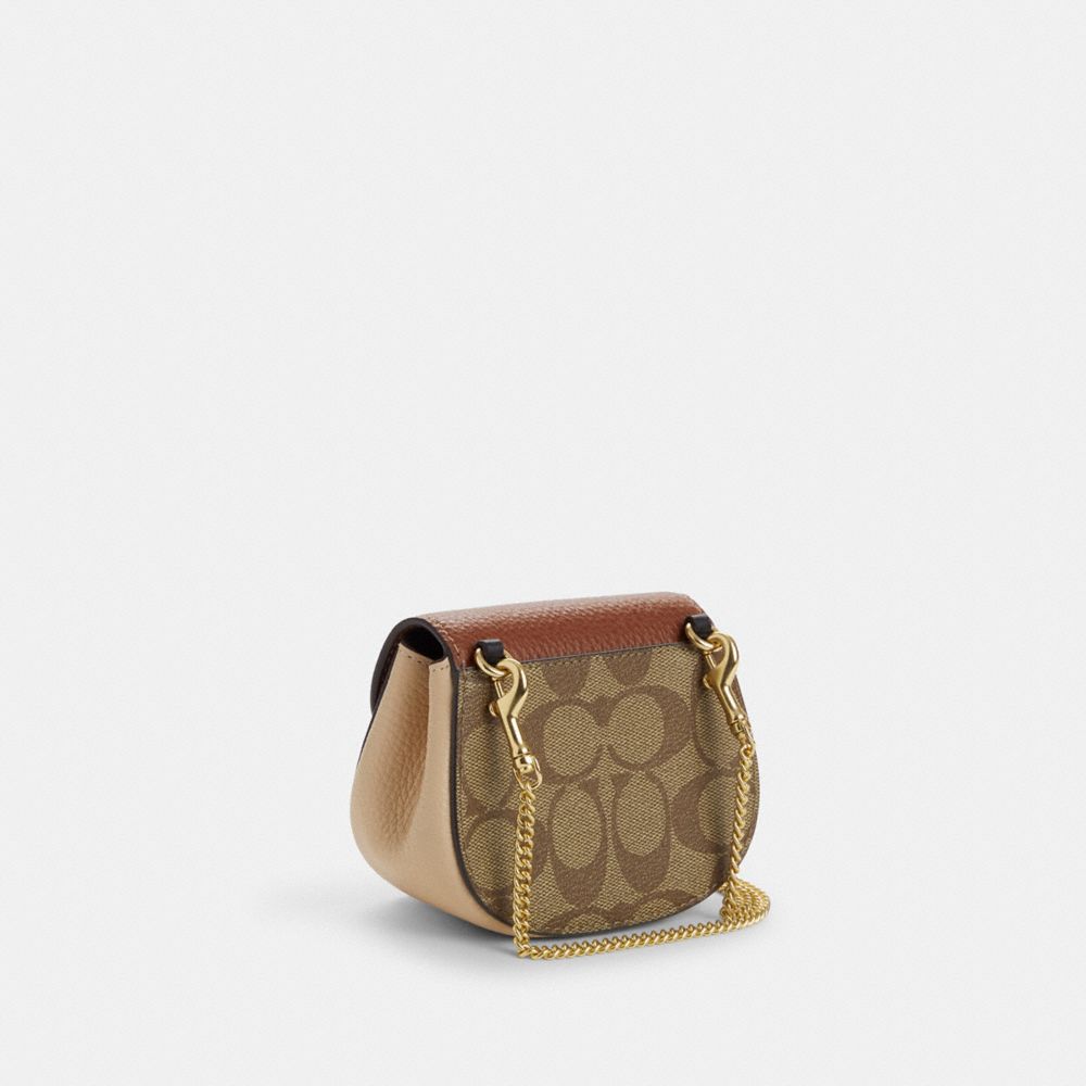 COACH®,MORGAN CARD CASE ON A CHAIN IN COLORBLOCK SIGNATURE CANVAS,Signature Canvas,Mini,Gold/Khaki Multi,Angle View