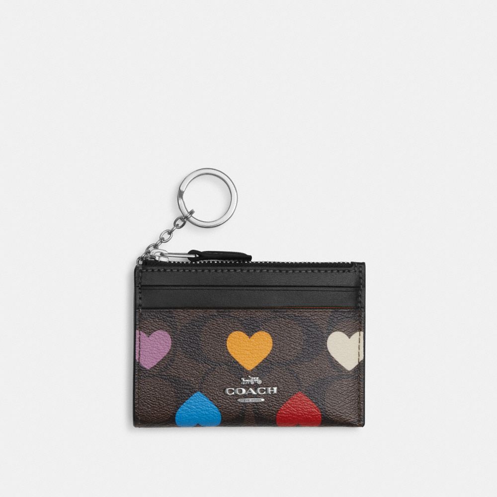 Mini Skinny Id Case In Signature Canvas With Heart Print