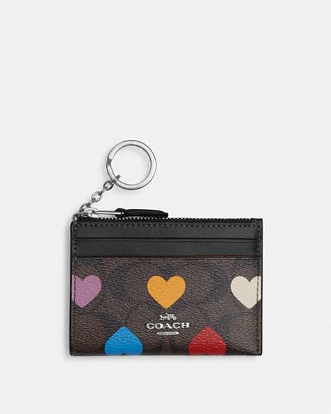 COACH®,MINI SKINNY ID CASE IN SIGNATURE CANVAS WITH HEART PRINT,pvc,Silver/Brown Black Multi,Front View
