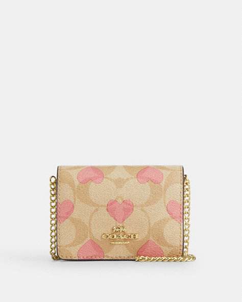 COACH®,BOXED MINI WALLET ON A CHAIN IN SIGNATURE CANVAS WITH HEART PRINT,pvc,Mini,Gold/Light Khaki Chalk Multi,Front View