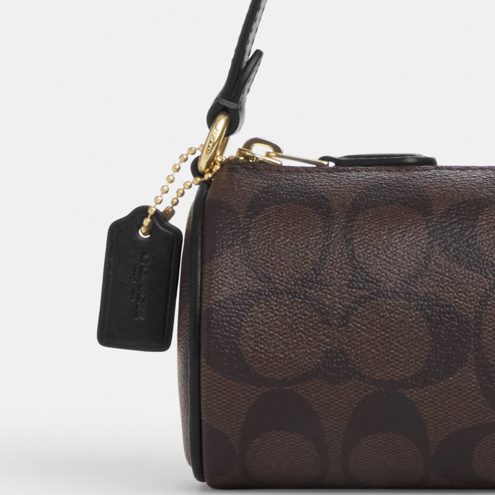 COACH®,Nolita Barrel Bag In Signature Canvas,Canvas,Cotton,Leather,Baguette,Logo,Gold Metal,Casual,Brown
