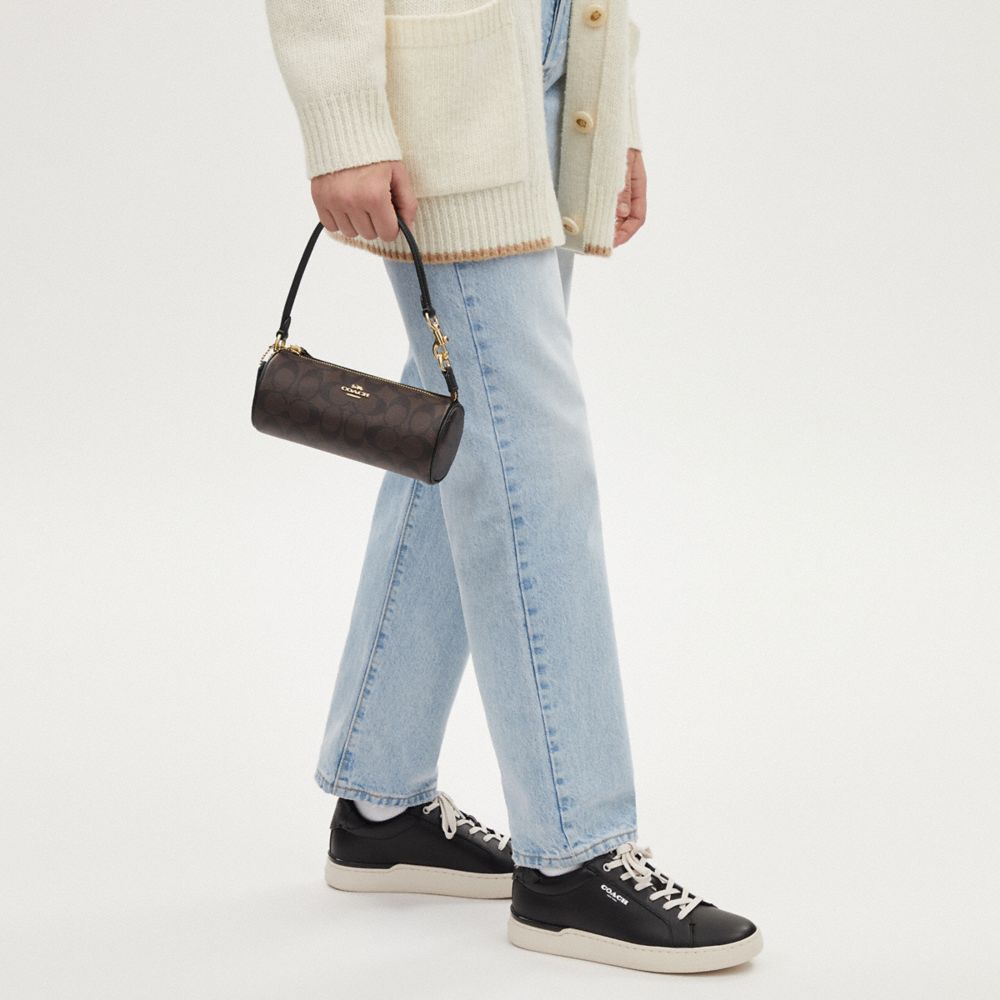 COACH®,Nolita Barrel Bag In Signature Canvas,Canvas,Cotton,Leather,Baguette,Logo,Gold Metal,Casual,Brown,Detail View