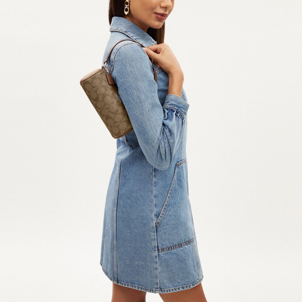 COACH®,SAC CYLINDRIQUE NOLITA EN TOILE SIGNATURE,Tissu en toile exclusif,Argent/Kaki/Selle,Detail View