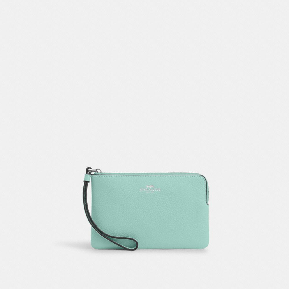 COACH®,CORNER ZIP WRISTLET,Pebbled Leather,Mini,Sv/Faded Blue,Front View