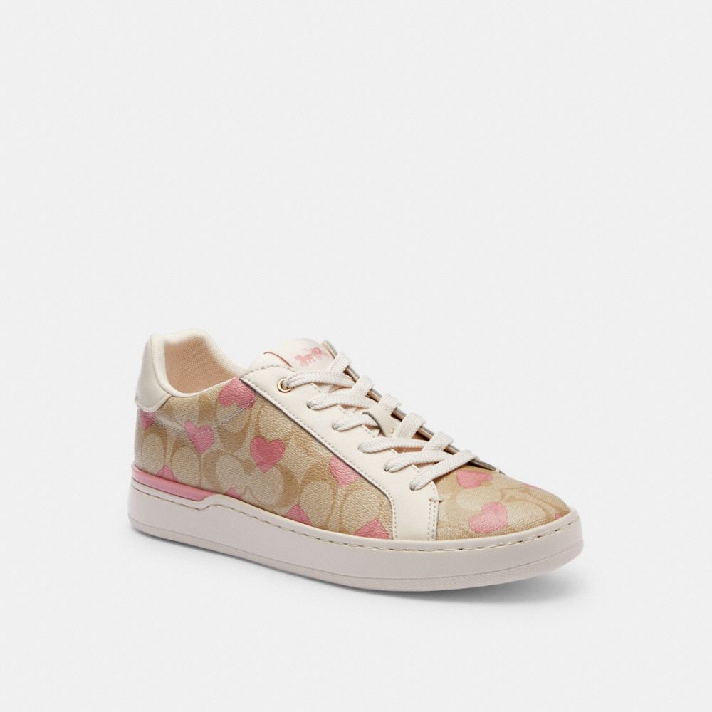 COACH®,CLIP LOW TOP SNEAKER IN SIGNATURE CANVAS WITH HEARTS,Light Khaki/Pink,Front View