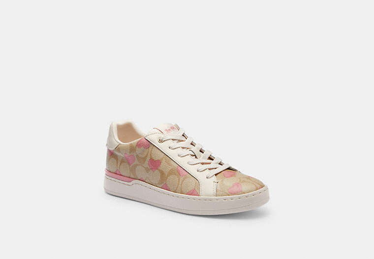 COACH®,CLIP LOW TOP SNEAKER IN SIGNATURE CANVAS WITH HEARTS,canvas,Light Khaki/Pink,Front View
