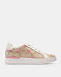 COACH®,CLIP LOW TOP SNEAKER IN SIGNATURE CANVAS WITH HEARTS,canvas,Light Khaki/Pink,Angle View