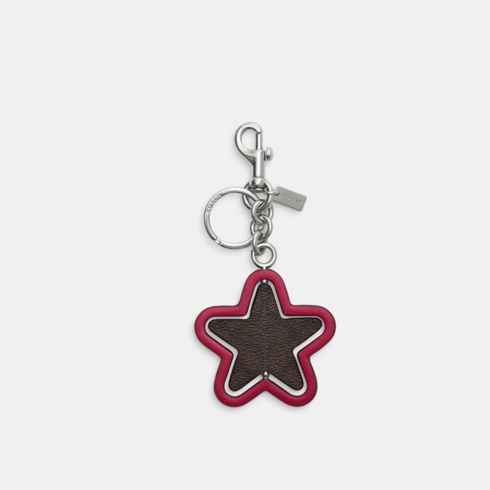 COACH®,SPINNING STAR BAG CHARM IN SIGNATURE CANVAS,Mini,Silver/Brown/Bright Violet,Front View