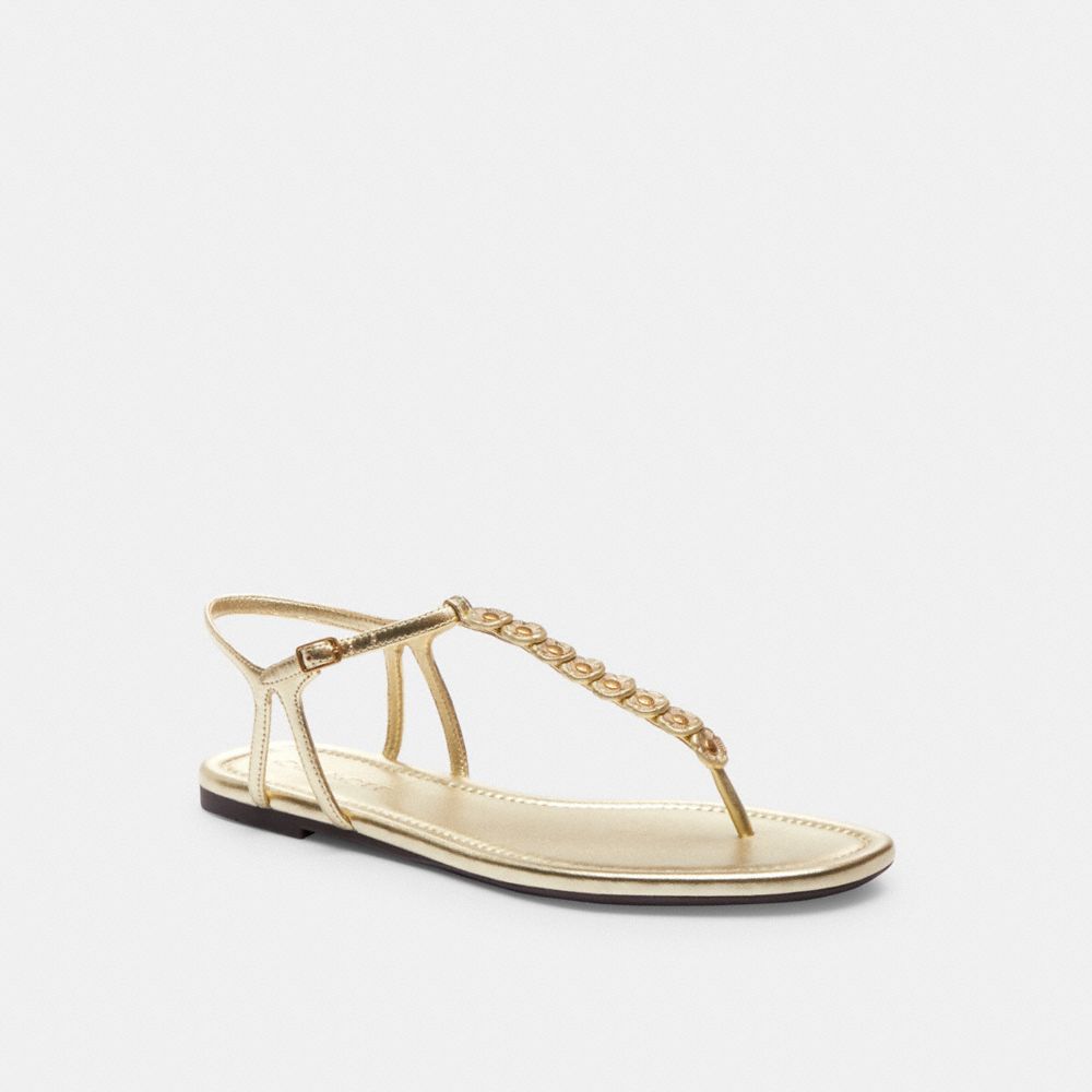 Coach gold flip store flops