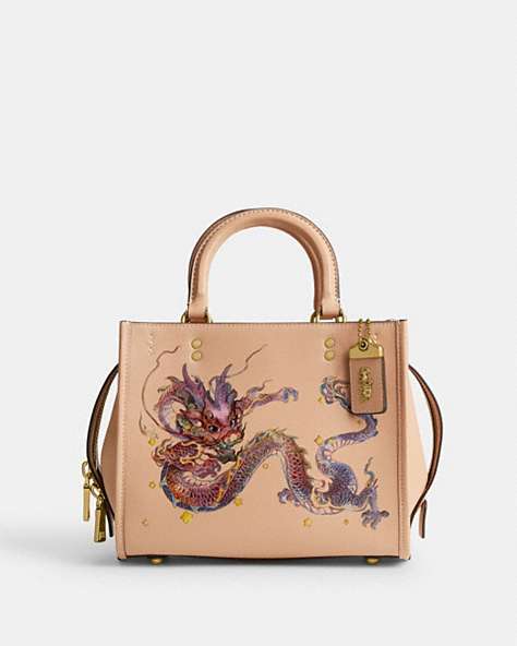 COACH®,BOXED NEW YEAR ROGUE BAG 25 WITH DRAGON,Glovetanned Leather,Medium,Brass/Buff Multi,Front View