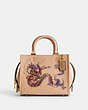 COACH®,BOXED NEW YEAR ROGUE BAG 25 WITH DRAGON,Glovetanned Leather,Medium,Brass/Buff Multi,Front View