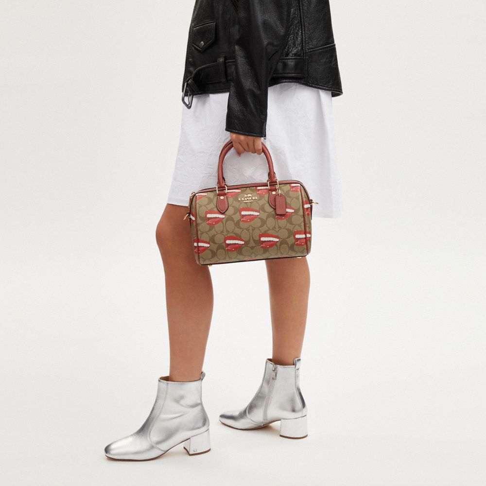 COACH®,Coach X Tom Wesselmann Rowan Satchel Bag In Signature Canvas,Canvas,Barrel Bag,Graphic,Gold Metal,Day Party,Casual,Brown,Detail View