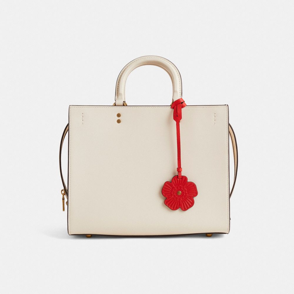 COACH®,Remade Tea Rose Bag Charm,Bag Charm,Studded,Floral Embellishment,Casual,Maroon,Angle View