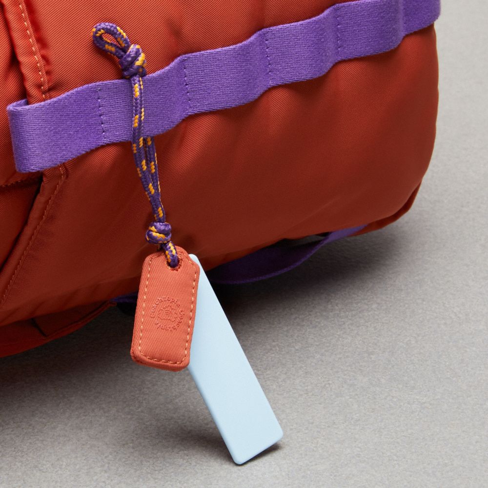 COACH®,Coachtopia Loop Backpack,Recycled Polyester,Backpack,Plastic,Color Block,Mixed Media,Applique,Casual,Burnt Orange,Detail View