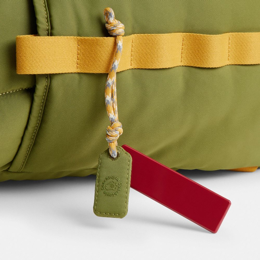 Shop Coach Topia Loop Backpack In Olive/multi Cording