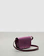 COACH®,Wavy Wallet with Crossbody Strap in Crinkled Patent Coachtopia Leather,Lilac Berry,Angle View