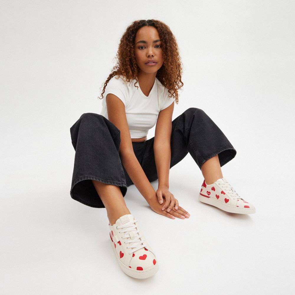 White sneakers 2024 red heart