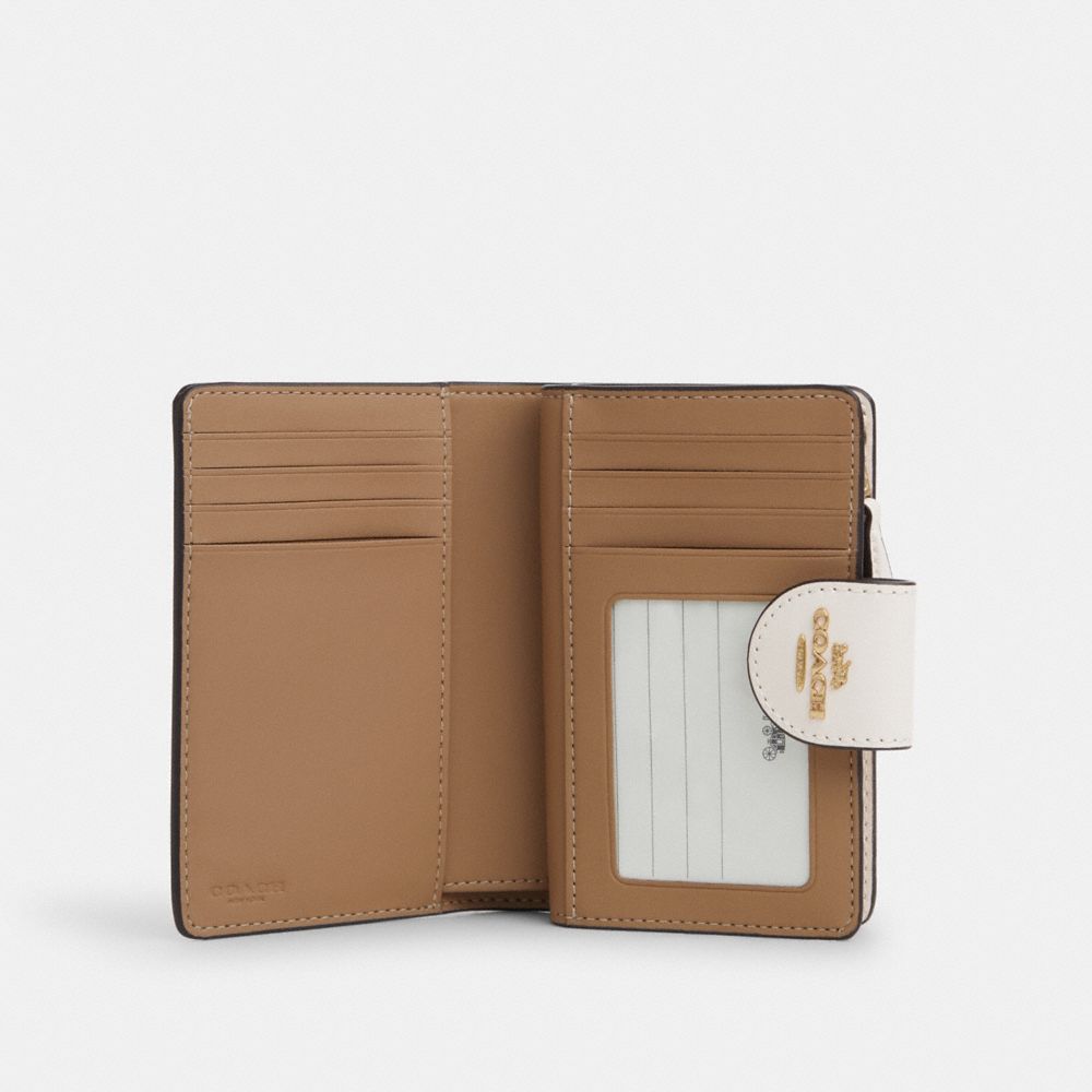 Medium Corner Zip Wallet In Signature Canvas With Heart Print