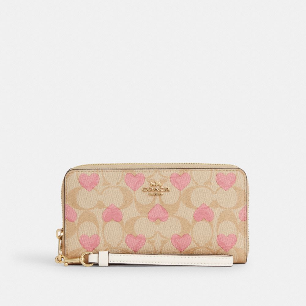 Coach zip 2025 around wristlet