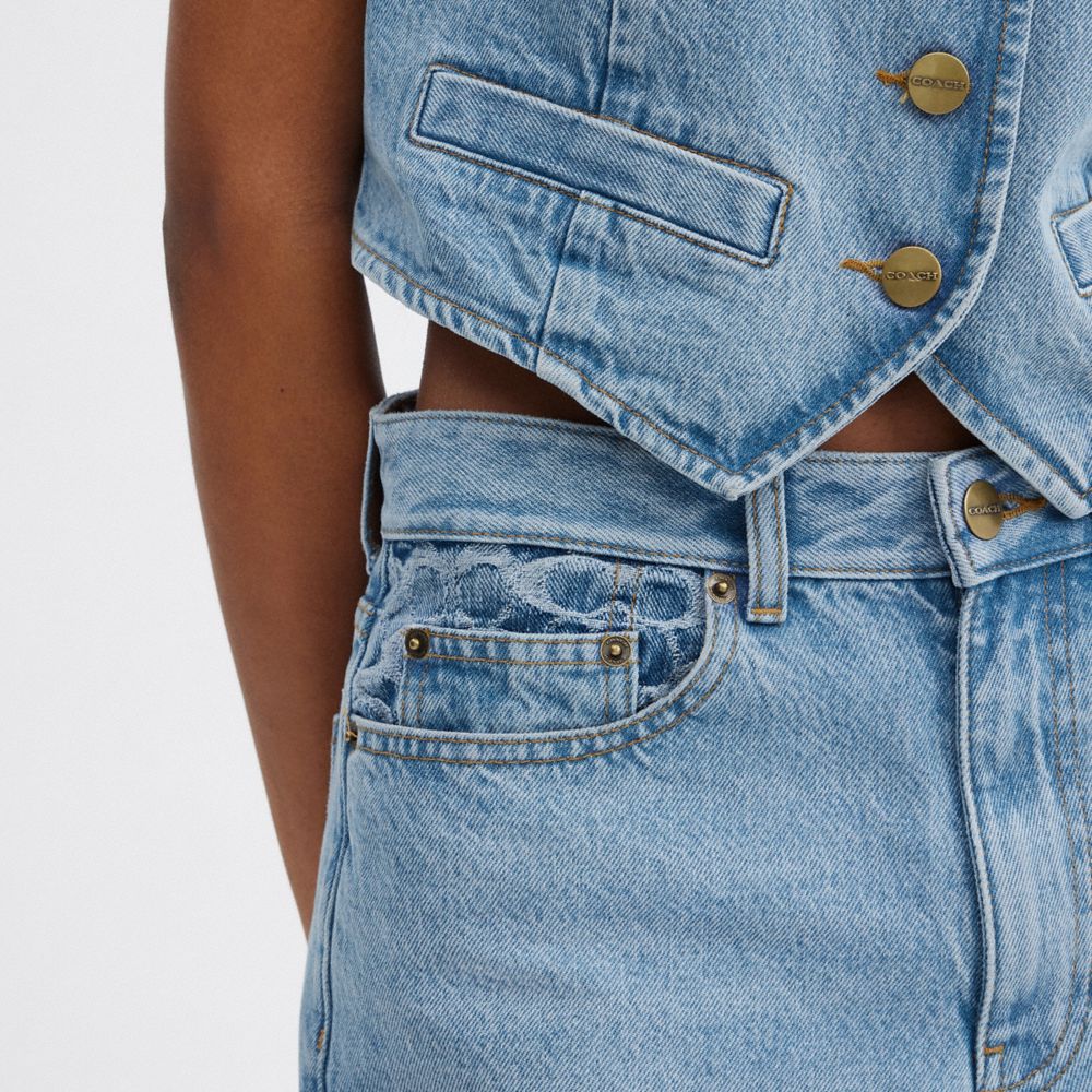 COACH®: Loose Fit Jeans