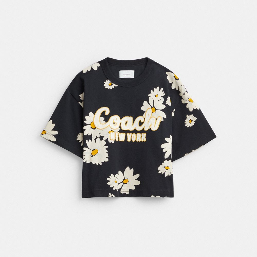 COACH®,T-SHIRT COURT EXCLUSIF AVEC INSCRIPTION ET FLEURS EN COTON BIOLOGIQUE,Noir,Front View