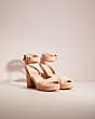 COACH®,RESTORED SERENA SANDAL,Suede,Beechwood,Angle View