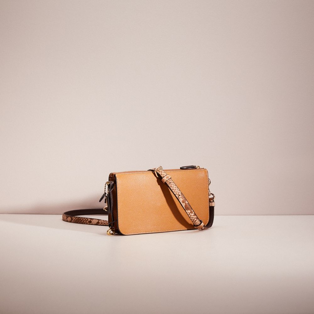 COACH®,Upcrafted Noa Pop Up Messenger In Colorblock,Leather,Pouch,Novelty Embellishment,Metal,Chain Detail,Logo,Casual,Brown,Angle View