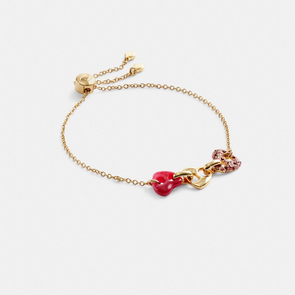 COACH®,PAVÉ HEARTS CHAIN LINK SLIDER BRACELET,Plated Brass,Gold/Pink Multi,Front View