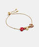 COACH®,PAVÉ HEARTS CHAIN LINK SLIDER BRACELET,Plated Brass,Gold/Pink Multi,Front View