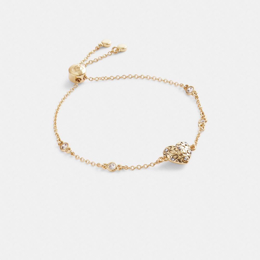 COACH®,QUILTED SIGNATURE HEART SLIDER BRACELET,Plated Brass,Gold,Front View