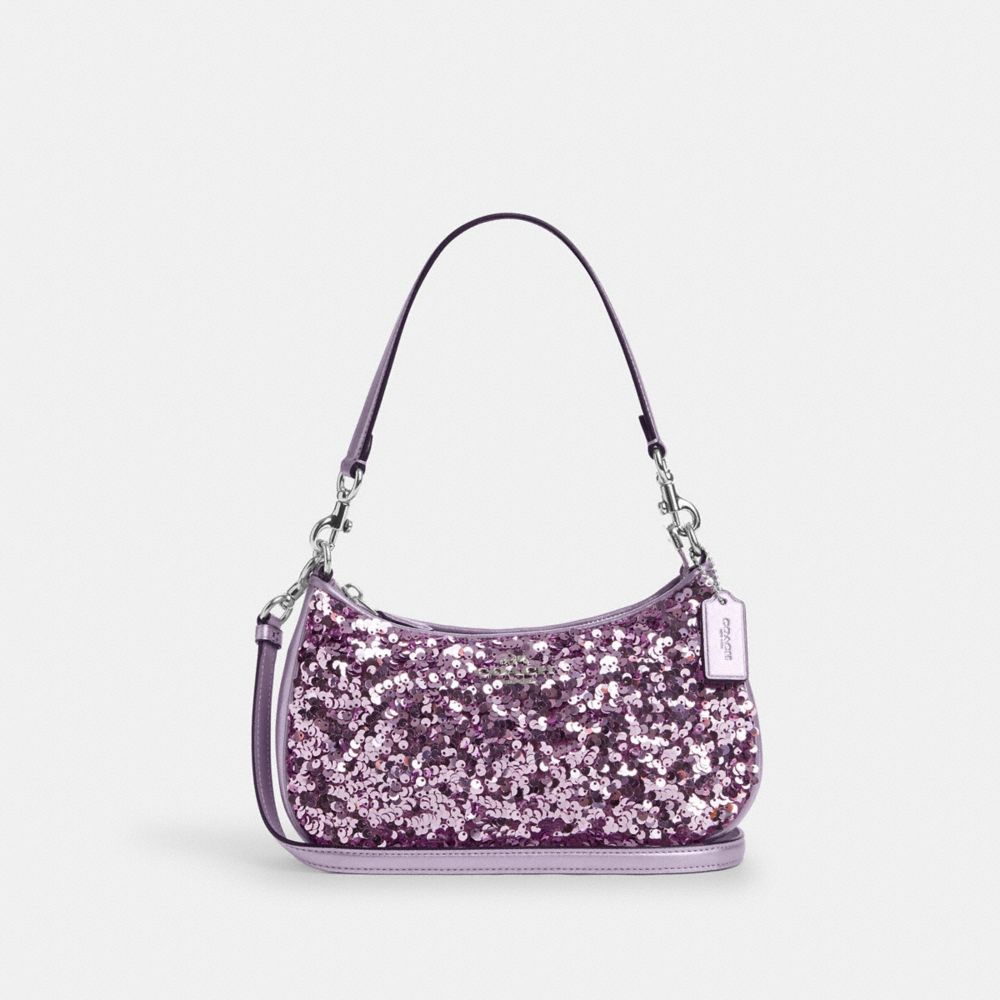 Pink glitter coach on sale purse