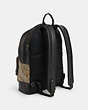 COACH®,WEST BACKPACK IN BLOCKED SIGNATURE CANVAS WITH VARSITY STRIPE,Coated Canvas,X-Large,Gunmetal/Khaki Multi,Angle View