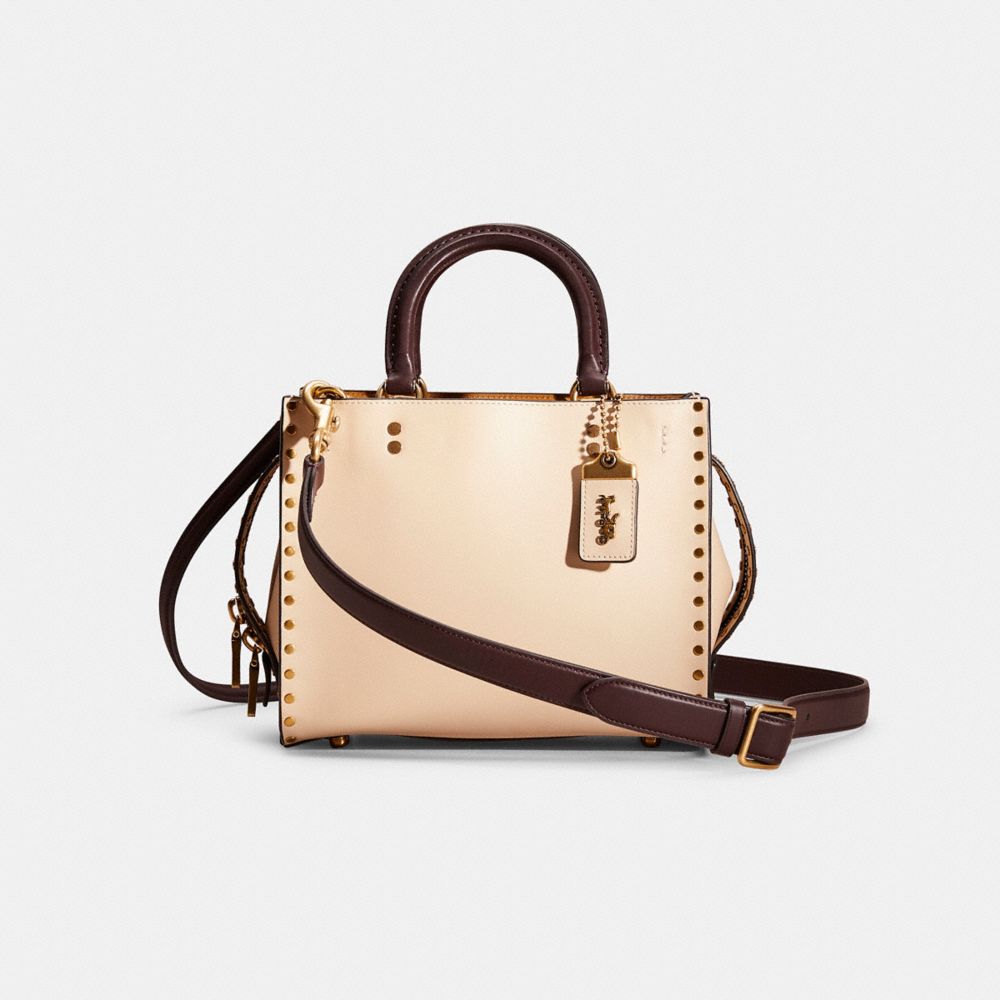 Coach rogue with rivets on sale