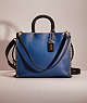 COACH®,RESTORED ROGUE IN COLORBLOCK WITH RIVETS,Brass/True Blue Multi,Front View