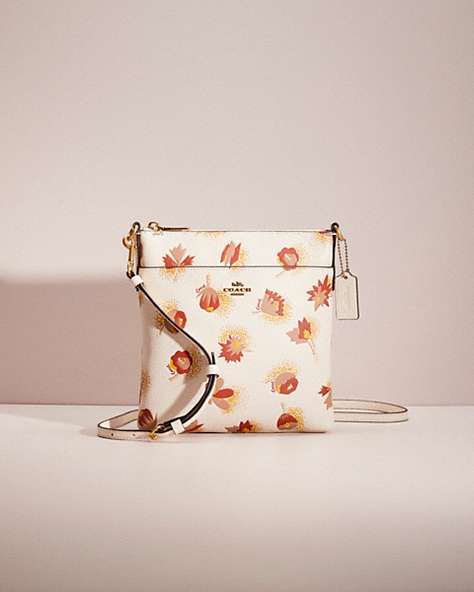 COACH®,RESTORED KITT MESSENGER CROSSBODY WITH FLORAL PRINT,Polished Pebble Leather,Mini,Brass/Chalk,Front View