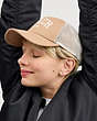 COACH®,COACH 1941 EMBROIDERED TRUCKER HAT,cottontwill,Light Saddle,Angle View