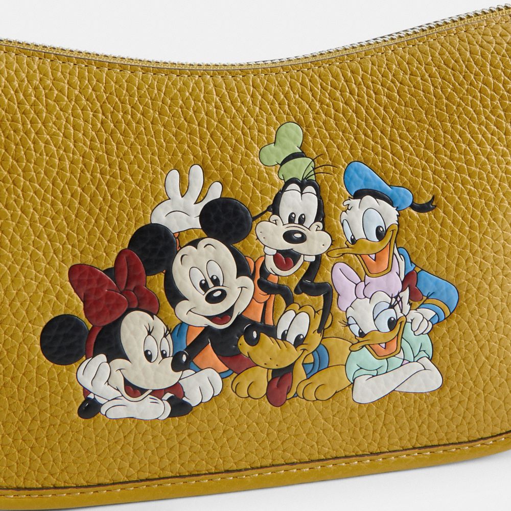 Coach Disney X  Swinger Bag In Regenerative Leather With Mickey Mouse And Friends In Silver/flax Multi