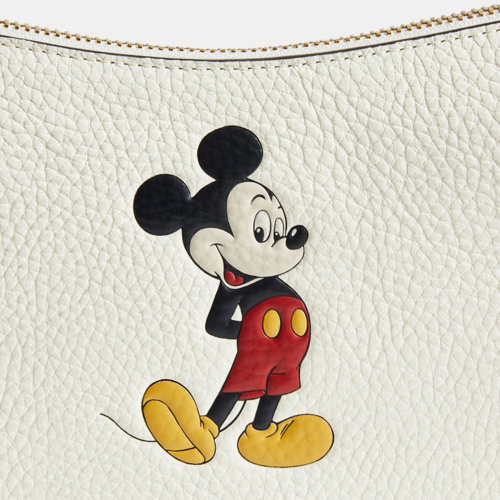 Coach Disney X  Swinger Bag In Regenerative Leather With Mickey Mouse In Brass/chalk Multi
