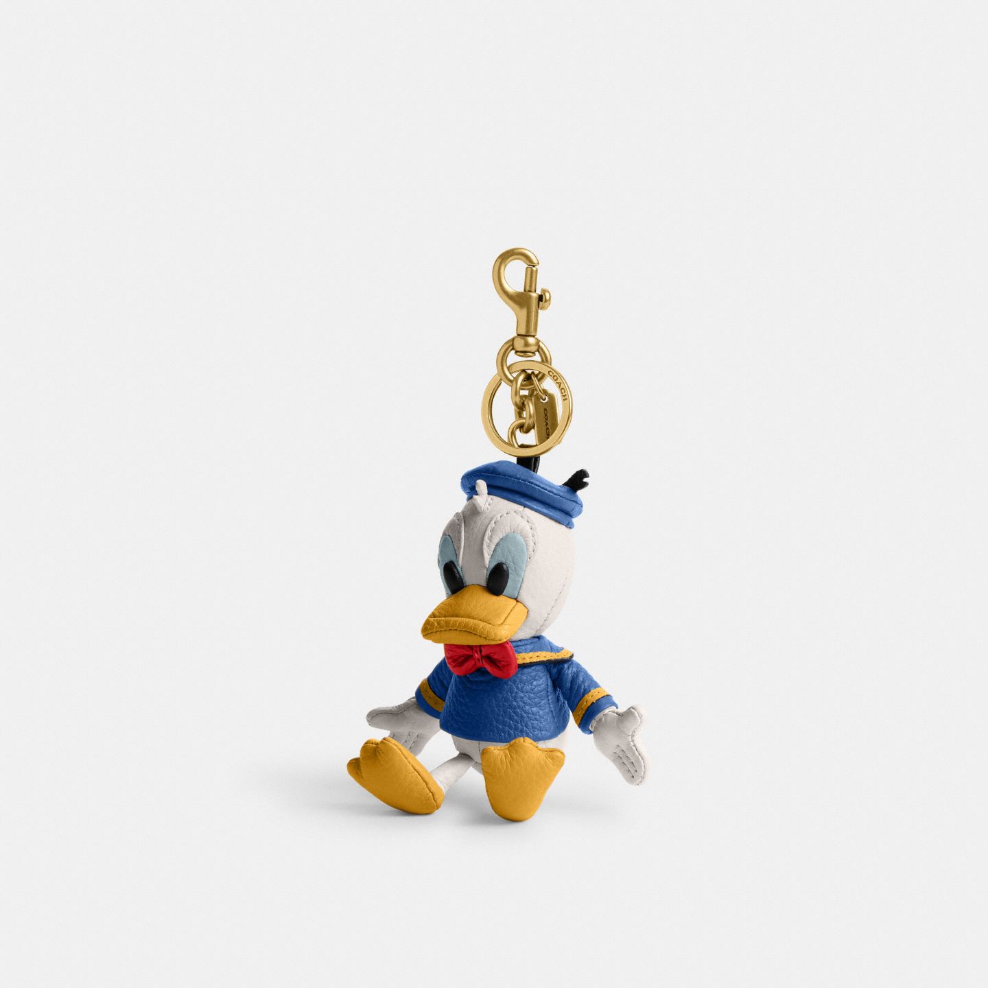 Женские брелоки Disney X Coach Donald Duck Collectible Bag Charm, цвет: Латунный / Меловой разноцветный — фото 1