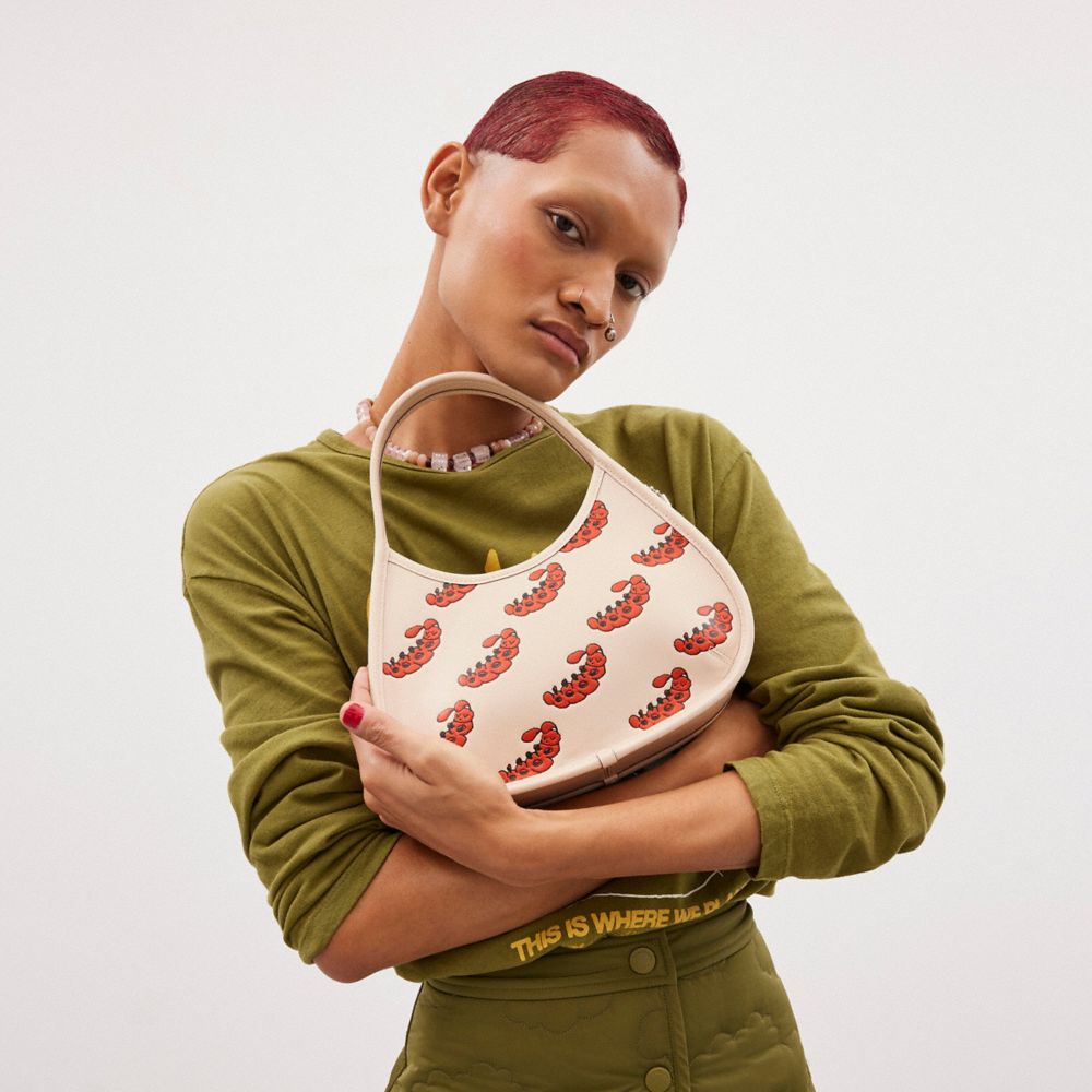 COACH®,Ergo Bag In Coachtopia Leather With Sleepy Caterpillar Print,,Detail View
