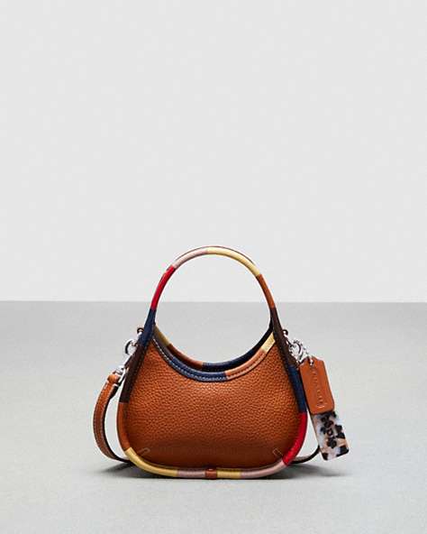 COACH®,Mini Ergo Bag with Crossbody Strap in Coachtopia Leather with Upcrafted Scrap Binding,Coachtopia Leather,...,Burnished Amber Multi,Front View