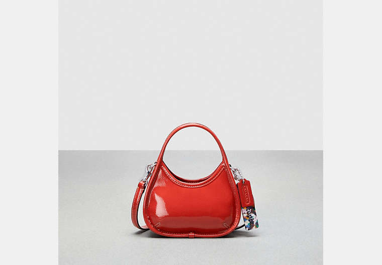 COACH®,Mini Ergo Bag with Crossbody Strap in Crinkled Patent Leather,Coachtopia Leather,Mini,Deep Orange,Front View image number 0
