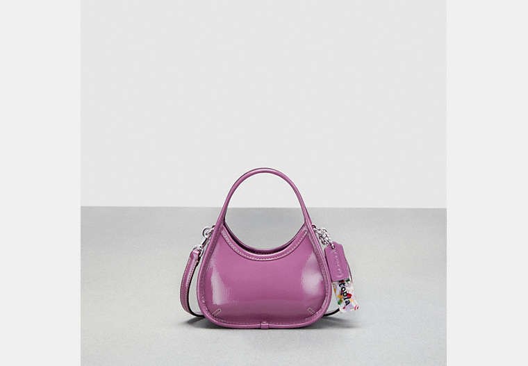 COACH®,Mini Ergo Bag with Crossbody Strap in Crinkled Patent Leather,Coachtopia Leather,Mini,Lilac Berry,Front View image number 0